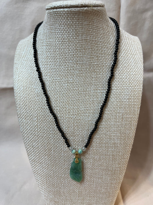 #106  Jade pendant